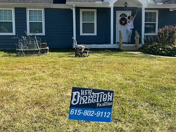 new direction painting yard sign