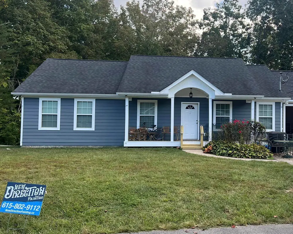 blue home with white accents, freshly painted