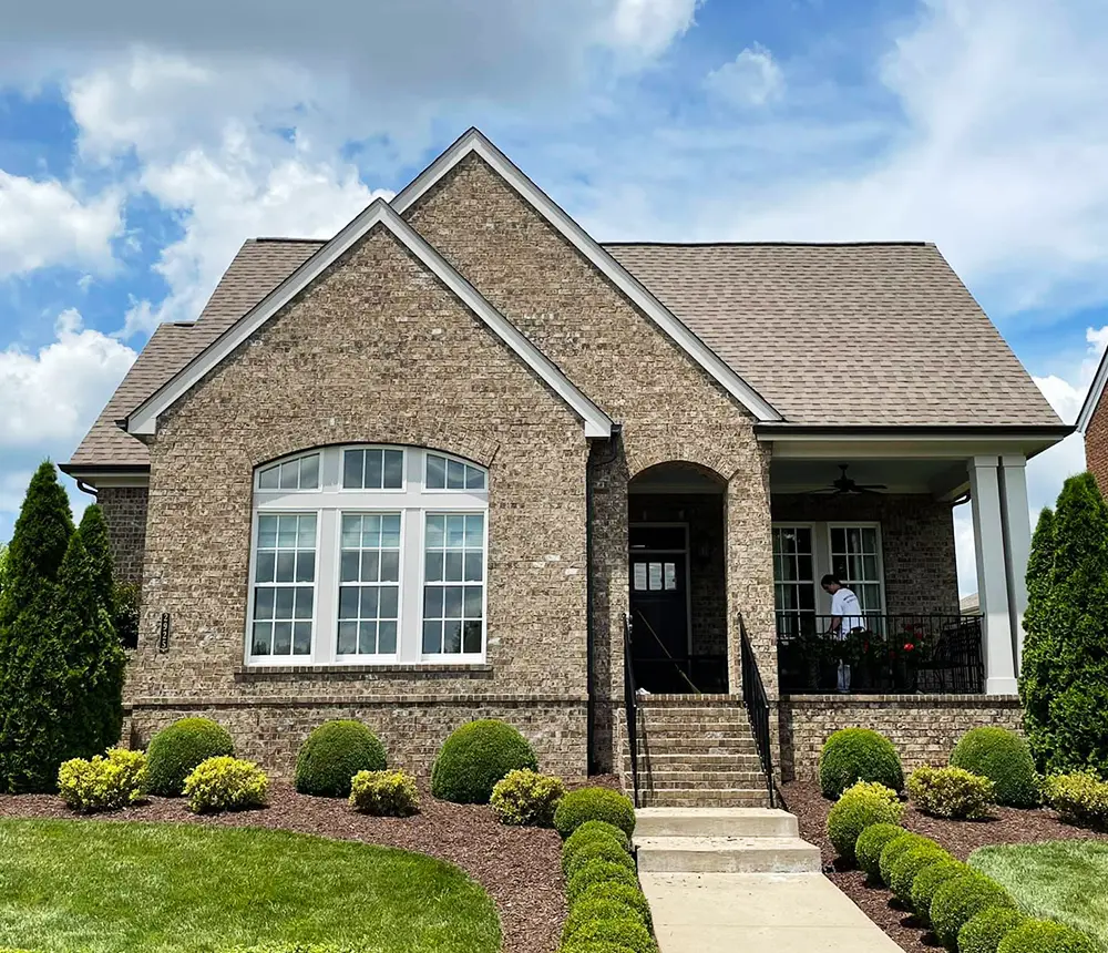 brick house with big windows