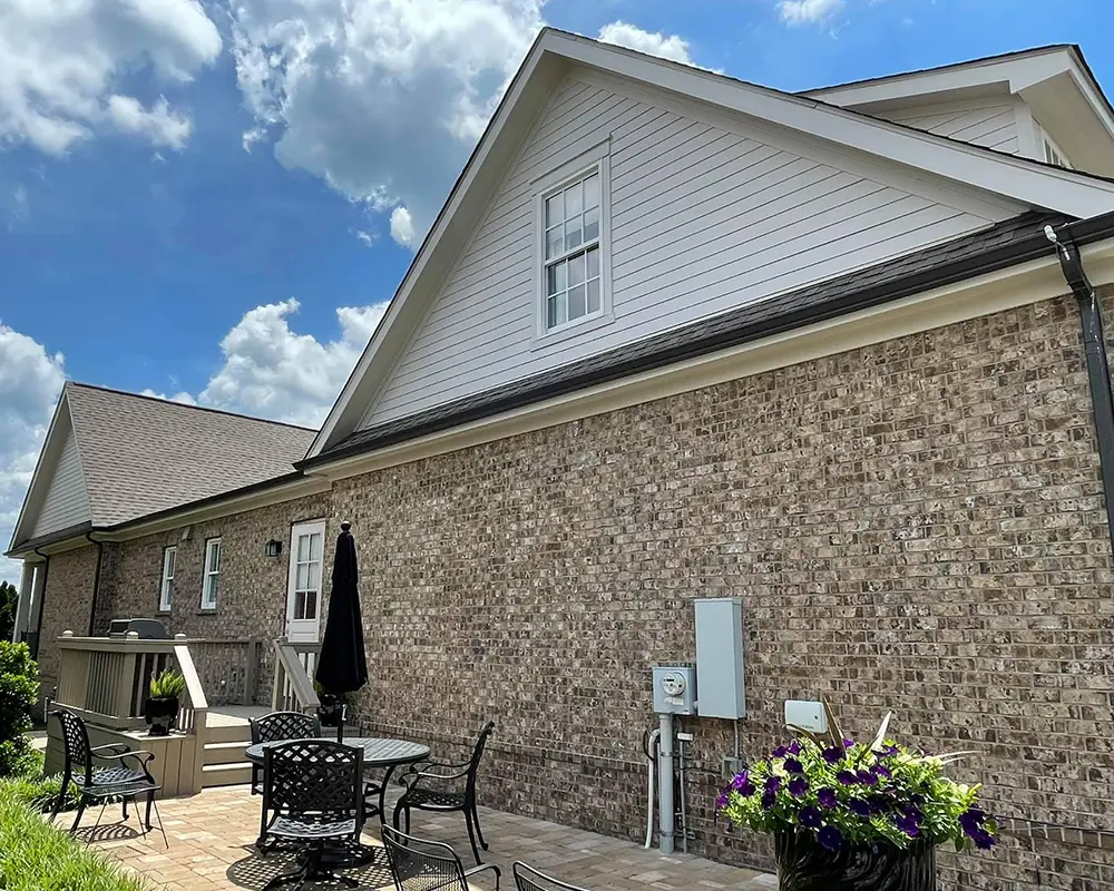 brick house with white wood