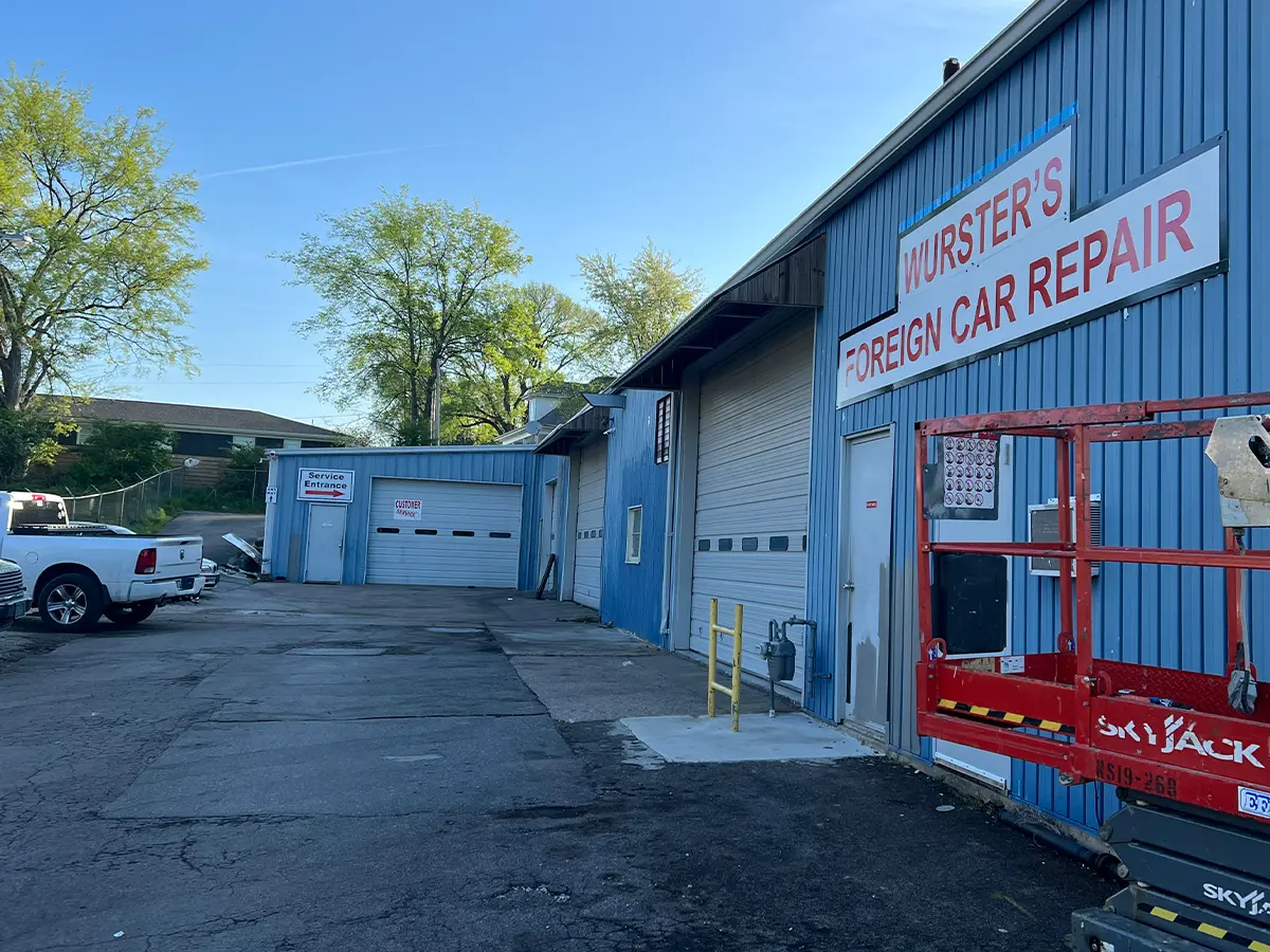 Outside of car repair shop, painted blue
